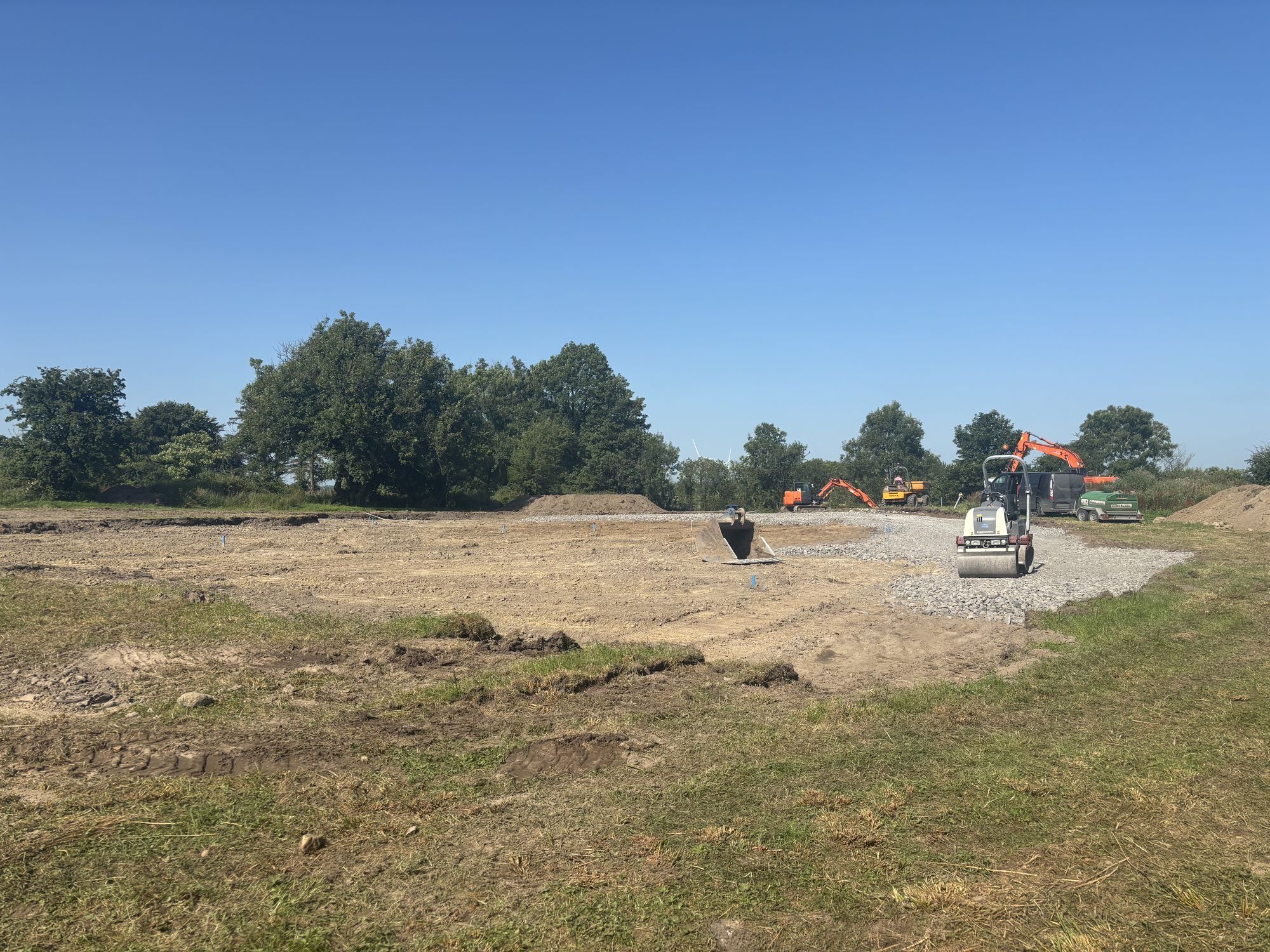 Site clearance and groundworks with a roller on a levelled site
