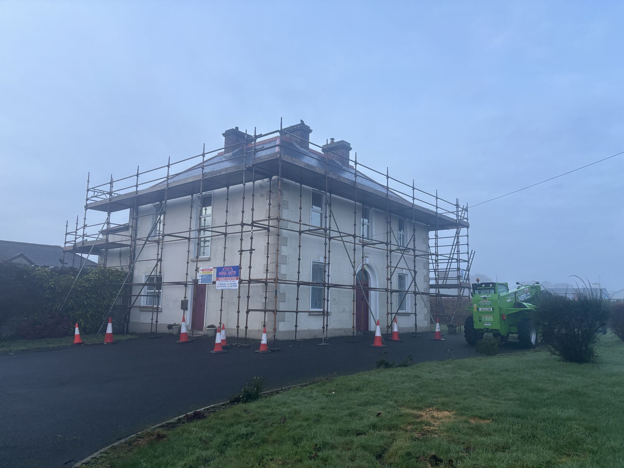 House wrapped in scaffolding during renovation works